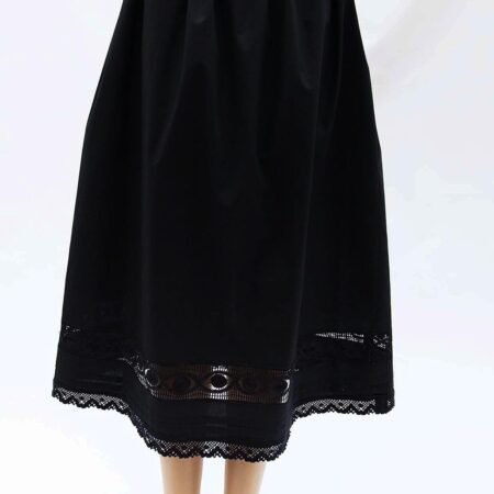 black cotton petticoat adorned with hand made lace trims and pleats