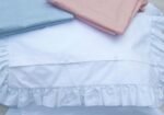 cotton pillowcases adorned with ruffles all around them