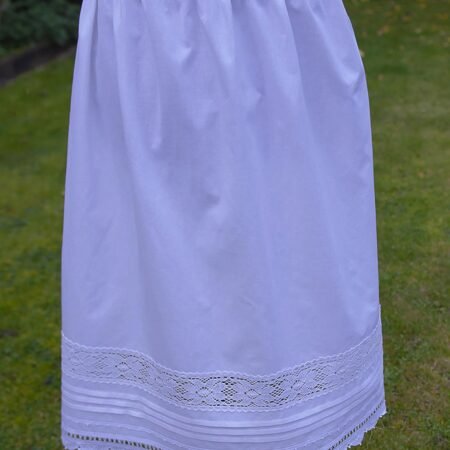 white cotton petticoat embellished with handmade lace trims
