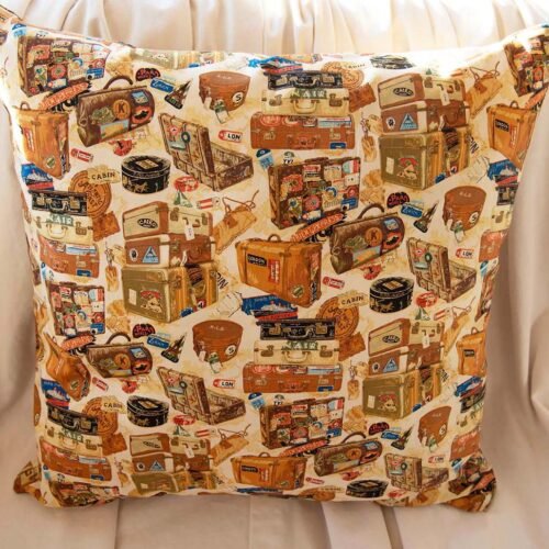 joyful cushion covers with delightful vintages suitcases prints on a beige base