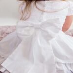 Bespoke Lace Firl First Holy Communion or Flower Girl Dress with a beautiful Lace Bodice and a long waist bow