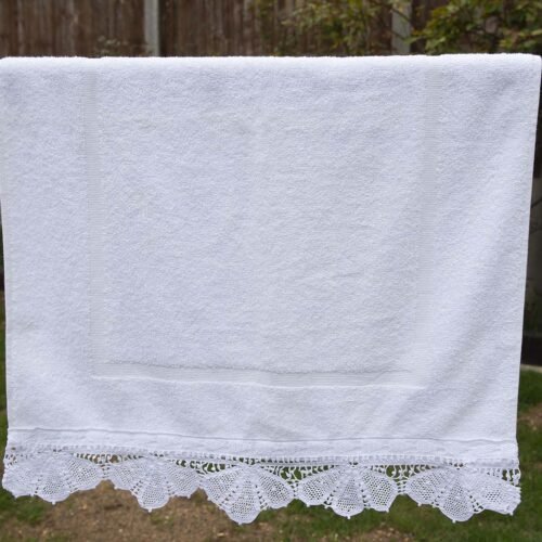 White Bathroom Towel Set: bath towels, hand towels and bathmat adorned with an edging handmade lace trim